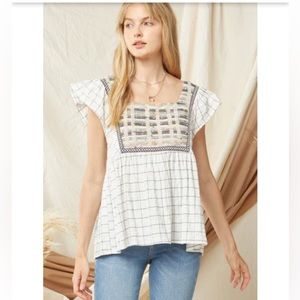 Multicolored stitch fabric square neck baby doll top ruffle sleeves size small.